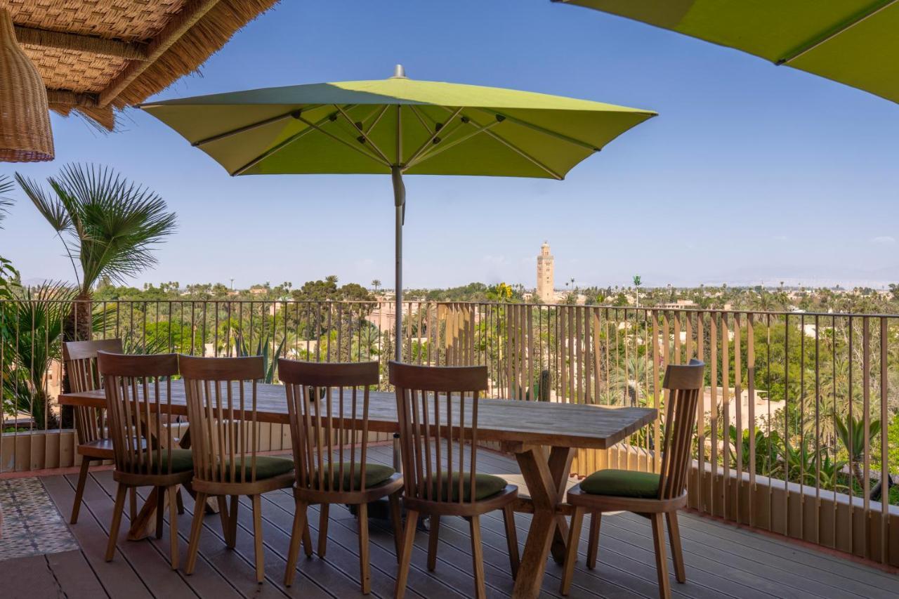 Hotel Jadali&Spa Marrakesch Exterior foto A patio umbrella